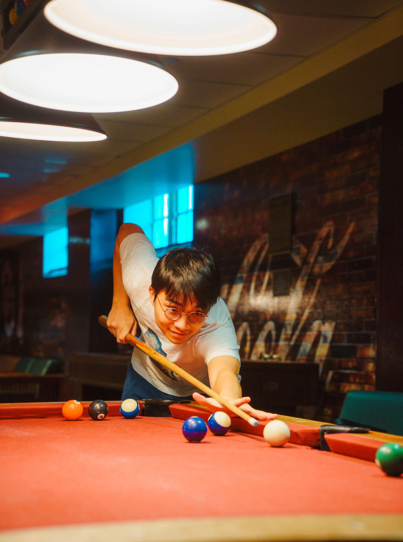 Player lining up a billiards shot